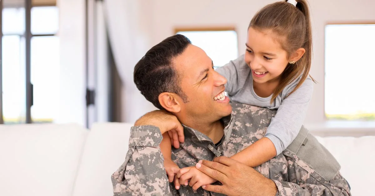 military father hugs daughter and thinks Can I switch orthodontists in the middle of treatment