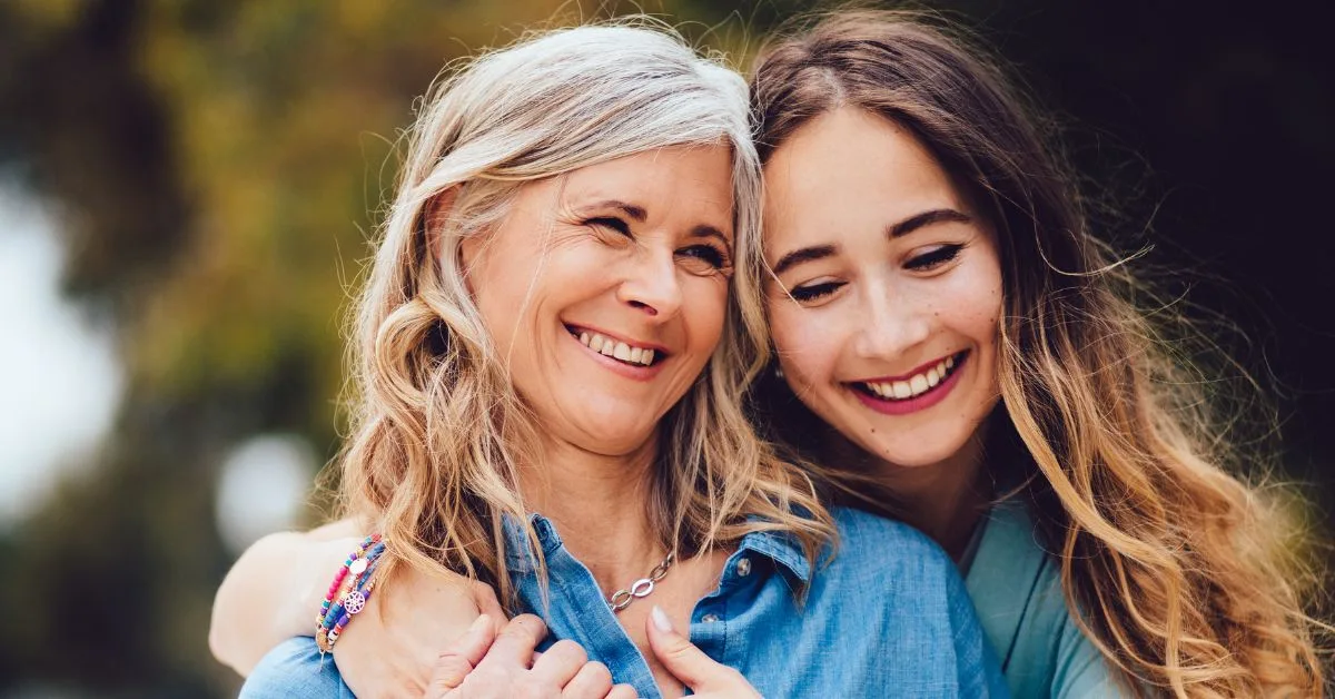 daughter hugs mother who asks is 70 too old for braces